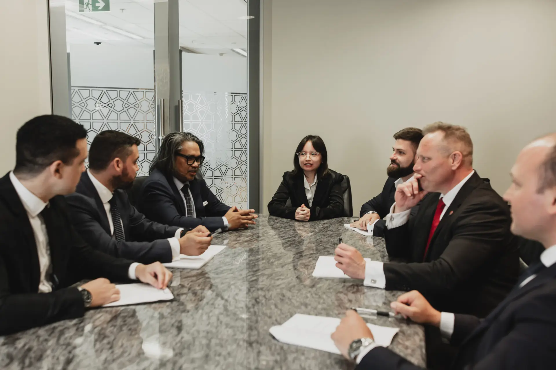 Director reviewing cash flow and creditor payments while company continues trading under insolvency risk